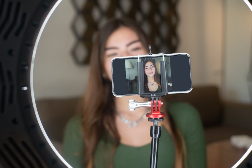 a woman taking a video of herself